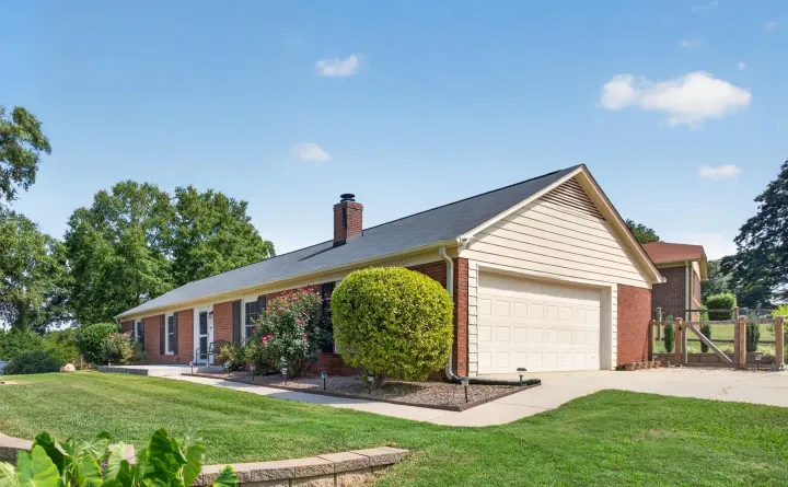 Side view with two-car attached garage